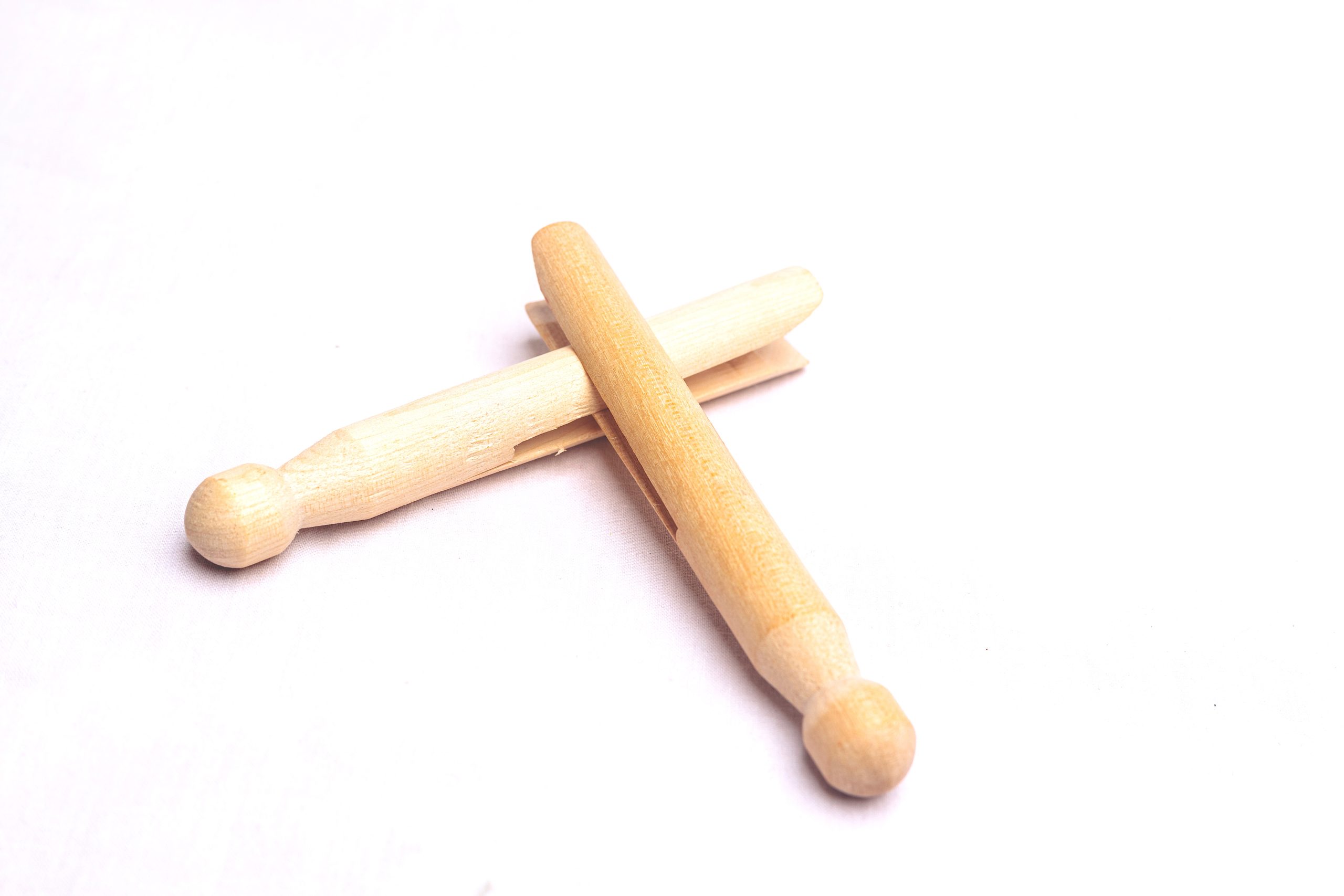 Digital photo of pegs to represent a hammer; a metaphor to express the idea that tech is like a tool.